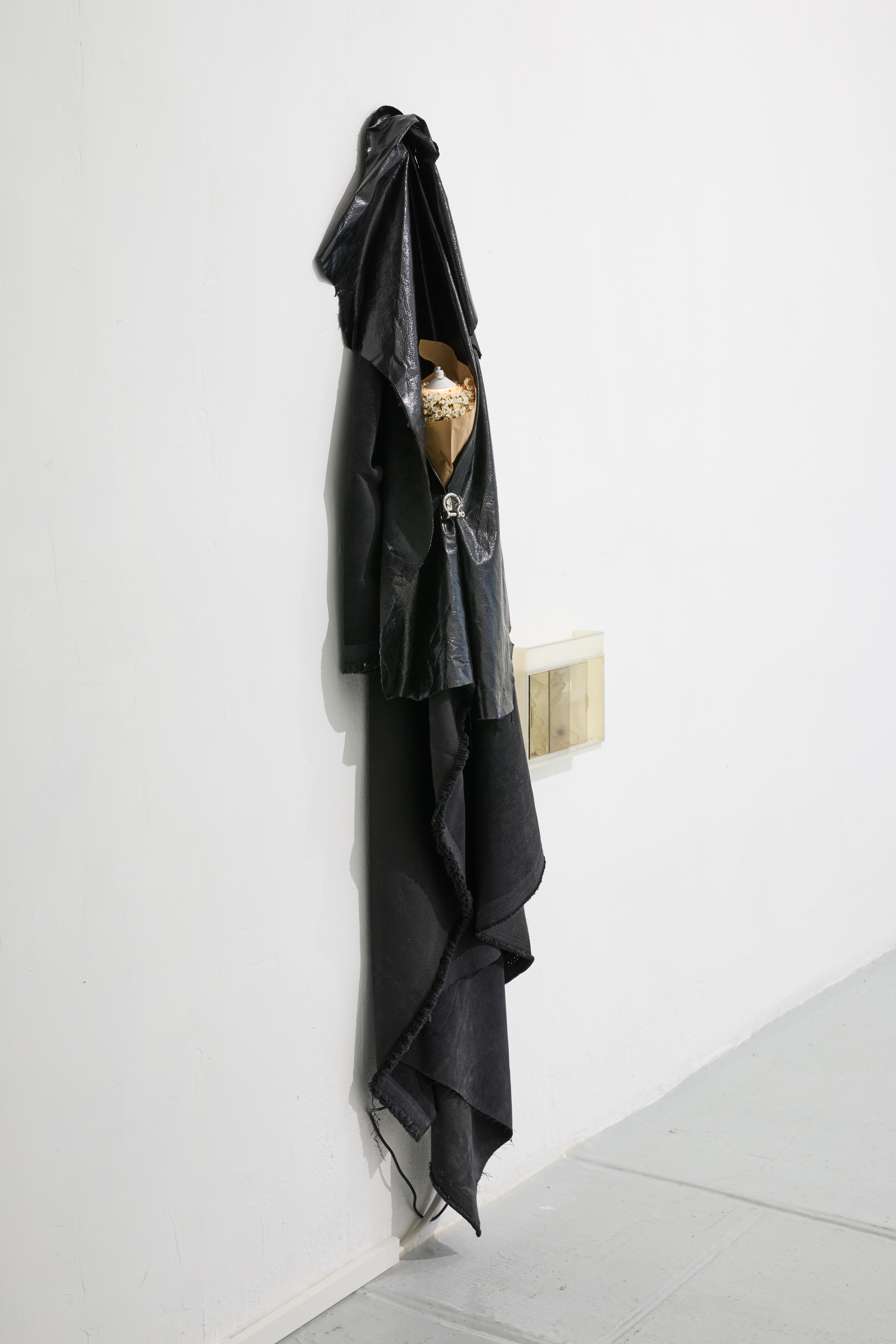 <em>Gustaw</em>, 2025. Leather, velvet, dried ivory Glixia, doll house lamp, steel. Exhibition view: <em>La Relève 7 - Notre Part Belle</em>, group show, Château de Servières, Marseille (FR), 2025, part of <em> Parallèle 15</em>. Curated by Plateforme Parallèle. Photo © Jean-Christophe Lett © Louïse Lett